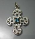 silver cross with blue topaz