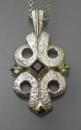 Sterling cross with iolite and peridot